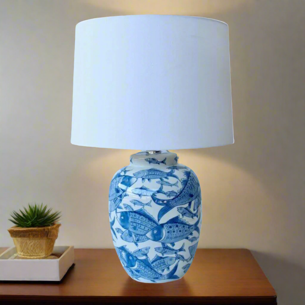 Unique Boys Blue & White Fish Lamp Base
Add a touch of oceanic whimsy to your space with our stunning Blue & White Fish Lamp Base from Unique Boys. Expertly handcrafted to perfection, this lamp features a playful fish design that sparks joy and catches the eye. Paired with an elegant off-white shade, this lamp base creates a harmonious balance that adds to the overall aesthetic of your roomwww.unique boys.co.za