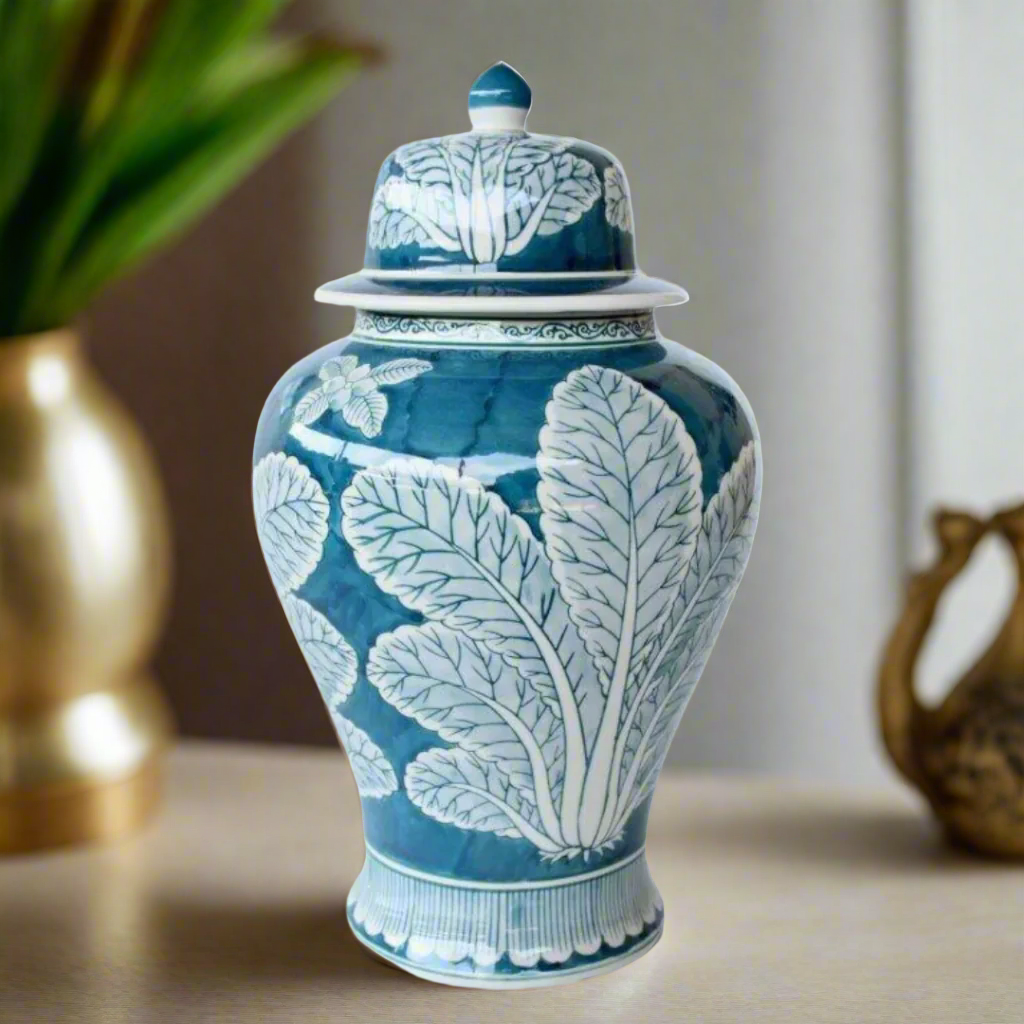Unique Boys Interiors
Blue and White Leaf Design Ginger Jar
Elevate your home decor with this exquisite blue and white leaf design ginger jar, handcrafted with traditional techniques and intricate details. This stunning piece adds a touch of elegance to any space, making it a perfect addition to your living room, dining room, or study.www.uniqueboys.co.za