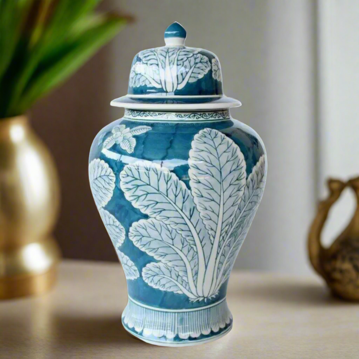 Unique Boys Interiors
Blue and White Leaf Design Ginger Jar
Elevate your home decor with this exquisite blue and white leaf design ginger jar, handcrafted with traditional techniques and intricate details. This stunning piece adds a touch of elegance to any space, making it a perfect addition to your living room, dining room, or study.www.uniqueboys.co.za