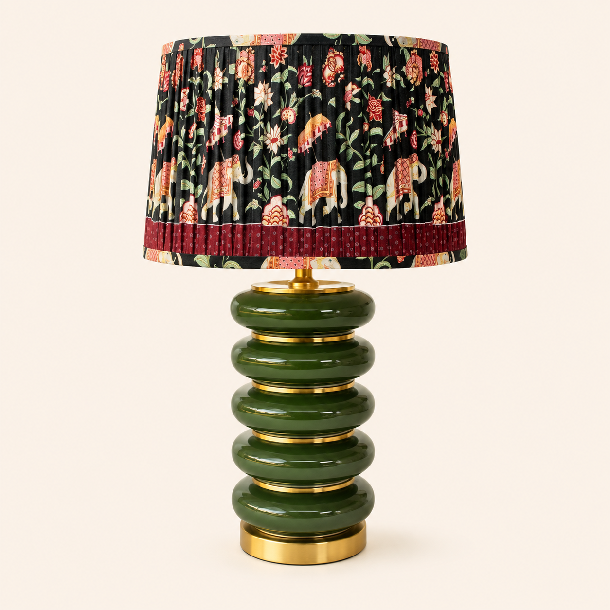 Add rich colour with this Bottle Green Elephant Lamp 62x36cm, featuring gold accents and a decorative shade.