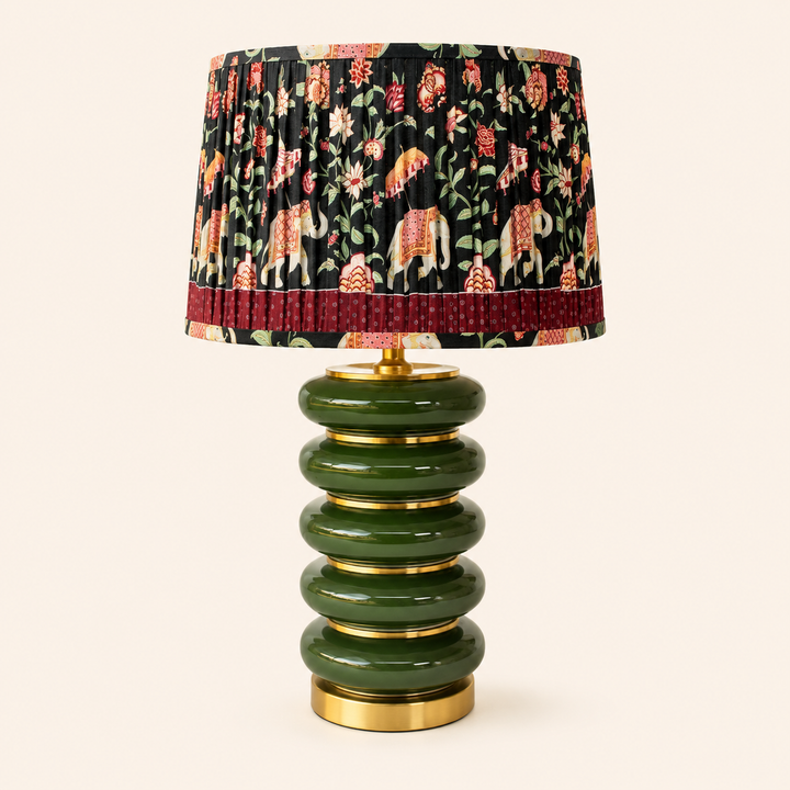 Add rich colour with this Bottle Green Elephant Lamp 62x36cm, featuring gold accents and a decorative shade.