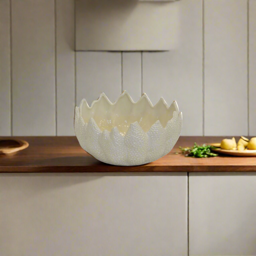 Ceramic Adora Bowl
Bring a burst of sunshine and whimsy to your gatherings with the vibrant Ceramic Adora Bowl, a unique and stylish serving piece.
Design Features:
Size: 32CM (L) x 30CM (W) x 15CM (H)
Material: Ceramic
Style: Vibrant, Whimsical, and Modern
Perfect For:
Serving snacks and appetizers
Displaying fruits and desserts
Adding a pop of color to your table setting
Elevate Your Entertaining:
Make your gatherings more memorable with the Ceramic Adora Bowl. Its unique design and vibrant colors will ad