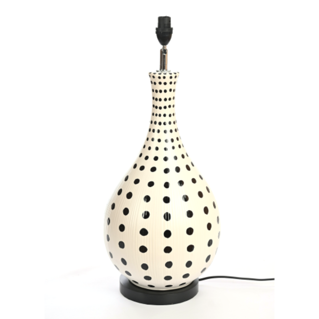 Ceramic Lamp Black &amp; Cream Dotty &nbsp;22 X 60 CM
Add a touch of coastal charm to your space with our stunning Ceramic Lamp Black &amp; Cream Dotty &nbsp;22 X 60 CM. This unique lamp features a soothing dotted base creating a natural and earthy ambiance perfect for relaxing or entertaining. Measuring 60 cm in height and 22cm in width, this lamp is perfectly sized for living rooms, bedrooms, or offices. www.uniqueboys.co.za