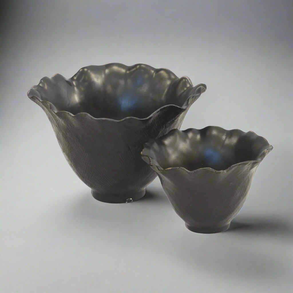 Ceramic Scalloped Petal Votives - Matt Black Set of 2
Elevate your interior with the sophisticated Ceramic Scalloped Petal Votives, expertly crafted from high-quality ceramic porcelain in a stunning matt black finish.
Design Features:
Set of 2 votives:
Large: 18cm (Height) x 26cm (Diameter)
Small: 12cm (Height) x 20cm (Diameter)
Scalloped petal design adds a unique and elegant touch
Matt black finish complements modern and minimalist interior styles
Perfect for displaying tea lights, candles, or small plant