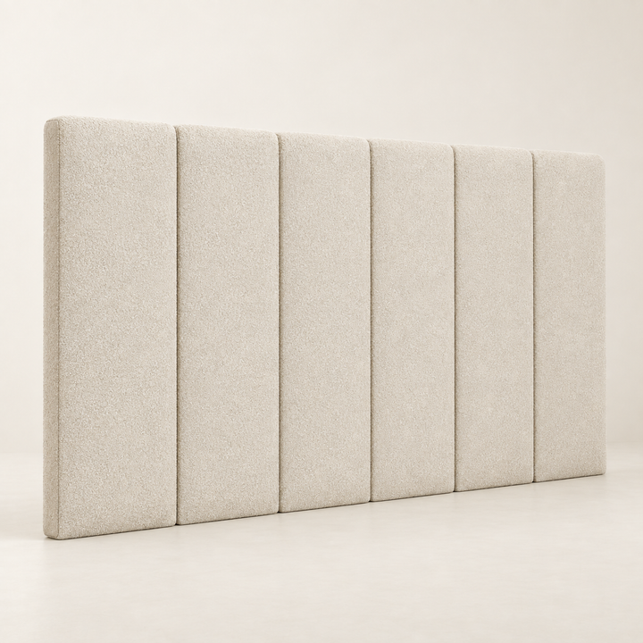 Large Munro upholstered headboard showing four padded panels and side wings