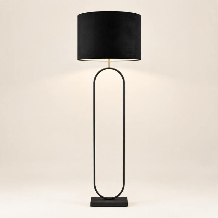 Cole Floor Lamp Black 1500mm features a sleek open-frame design, perfect for elegant modern interiors.