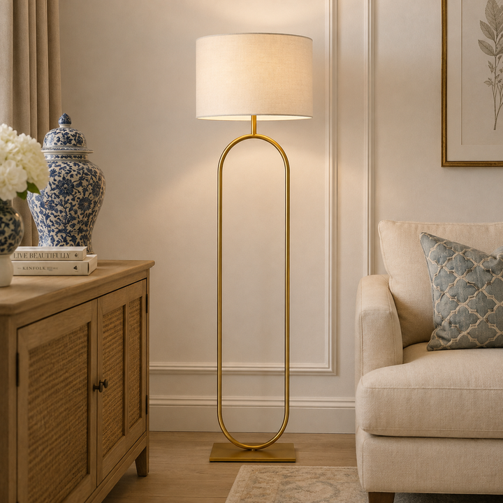 Elevate your décor with the Cole Floor Lamp Gold, featuring a refined gold frame and timeless modern style.