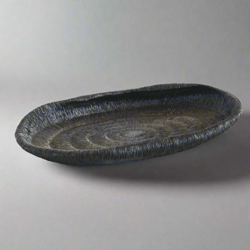 Coral Platter - Black
Elevate your home decor with the sleek and modern Coral Platter in black, expertly crafted by Unique Boys.
Design Features:
Size: 35cm x 22cm
Unique coral-inspired design adds a touch of sophistication
Intricate interior pattern creates visual interest and depth
Perfect for displaying decorative items, knickknacks, and trinkets
Decorating Ideas:
Add a touch of modern elegance to your coffee table or console
Display jewelry, candles, or small decorative items
Use as a centerpiece or acc