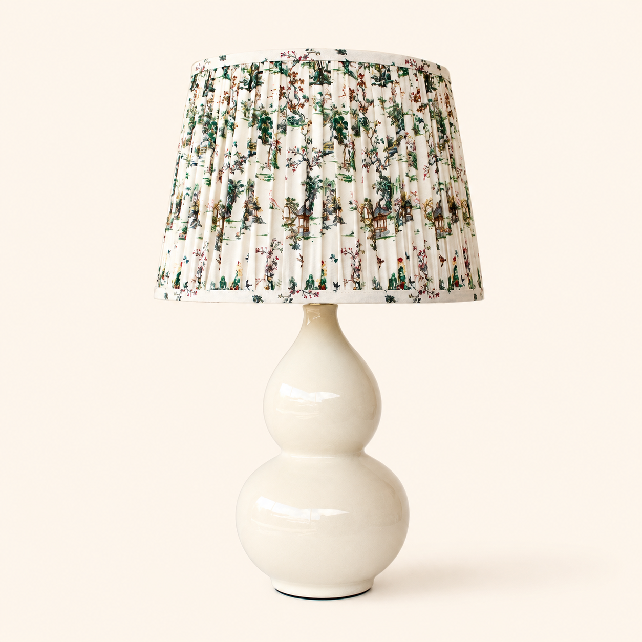 Cream Bulbous Lamp with Toile Shade 65x38cm, combining graceful curves with beautiful scenic detailing.