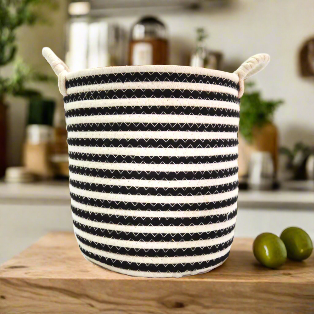 Crossings Basket - Elevate Your Home Decor!
Discover the perfect blend of style and functionality with our Crossings Basket, exclusively at Unique Boys!
Sleek Design Meets Versatility:
Expertly crafted with a sleek design, this stunning basket boasts a 25cm height and width. Made with soft white cotton handles, it's perfect for:
Organizing and storing books, magazines, or knick-knacks
Adding a touch of style to your living room, bedroom, or office
Creating a cozy and inviting atmosphere