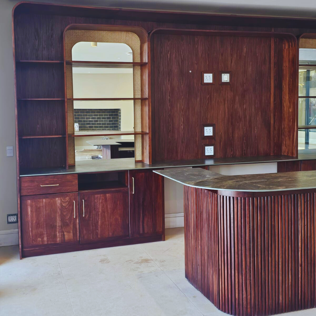 Custom Made Slatted Kiaat Bar
Elevate your entertaining space with our bespoke Slatted Kiaat Bar, crafted to your exact specifications. This stunning bar features a unique slatted design, showcasing the natural beauty of Kiaat wood. Unique Boys.