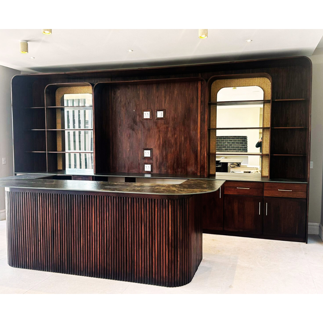 Custom Made Slatted Kiaat Bar
Elevate your entertaining space with our bespoke Slatted Kiaat Bar, crafted to your exact specifications. This stunning bar features a unique slatted design, showcasing the natural beauty of Kiaat wood. Unique Boys.