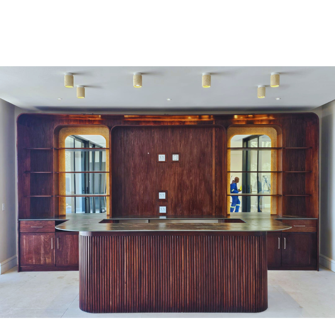 Custom Made Slatted Kiaat Bar
Elevate your entertaining space with our bespoke Slatted Kiaat Bar, crafted to your exact specifications. This stunning bar features a unique slatted design, showcasing the natural beauty of Kiaat wood. Unique Boys.