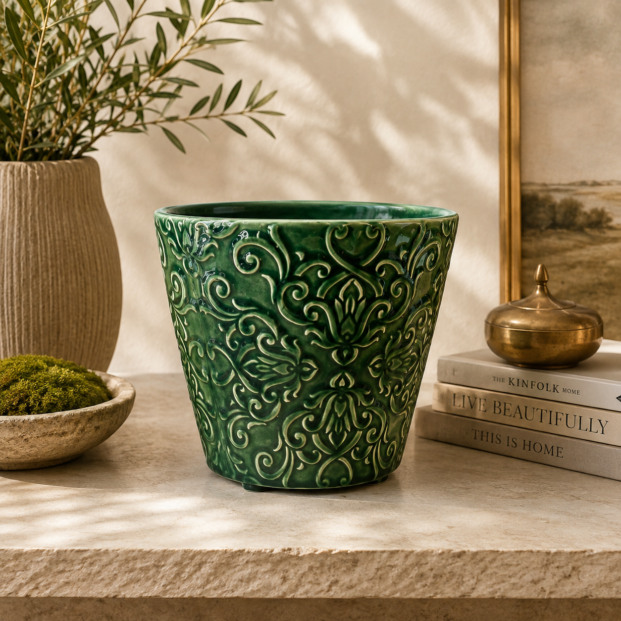 Luxury Damasque ceramic planter featuring intricate raised scroll detailing and rich green glazed finish.