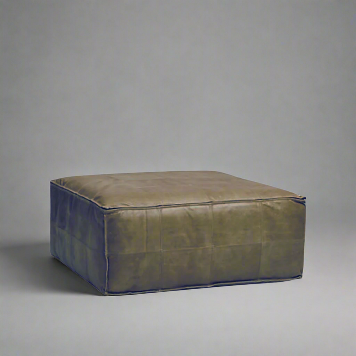 Delta Square Ottoman Full Grain Leather : Handcrafted Luxury for the Modern Home
Elevate your living space with our exquisite Delta Round Ottoman, meticulously handmade to transform your room into a serene retreat. Experience the perfect blend of style and comfort with our bespoke furniture.