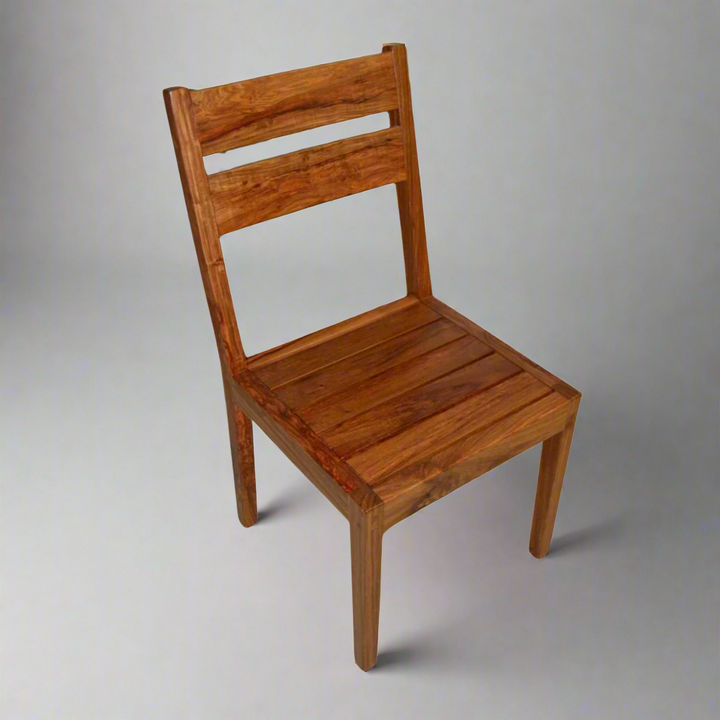 Deluxe Kiaat Chair: Elegant Simplicity
Experience the beauty of natural wood with the Deluxe Kiaat Chair. This stylish chair features a wooden seat and a sturdy design, perfect for adding a touch of elegance to any room.