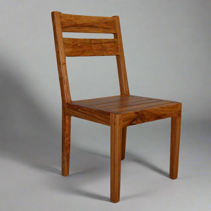 Deluxe Kiaat Chair: Elegant Simplicity
Experience the beauty of natural wood with the Deluxe Kiaat Chair. This stylish chair features a wooden seat and a sturdy design, perfect for adding a touch of elegance to any room.