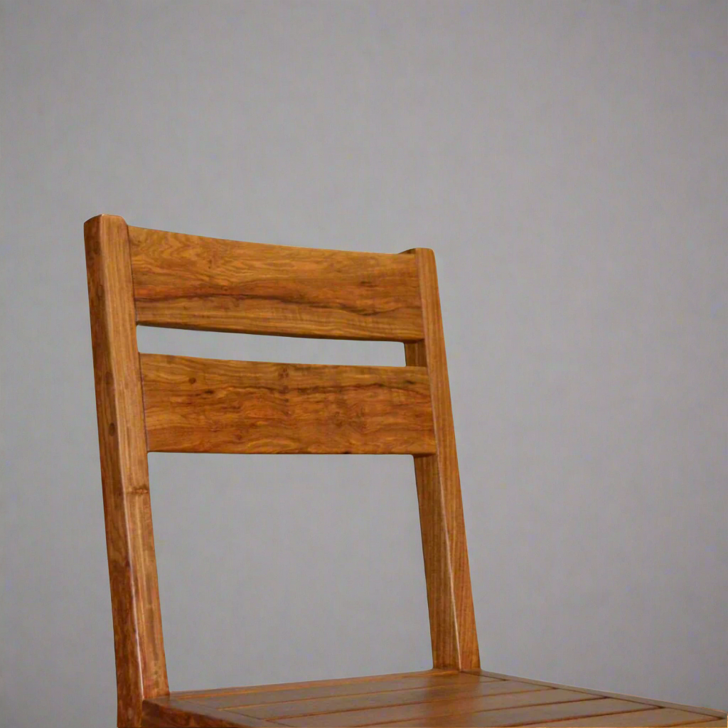 Deluxe Kiaat Chair: Elegant Simplicity
Experience the beauty of natural wood with the Deluxe Kiaat Chair. This stylish chair features a wooden seat and a sturdy design, perfect for adding a touch of elegance to any room.