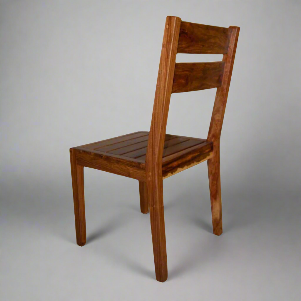 Deluxe Kiaat Chair: Elegant Simplicity
Experience the beauty of natural wood with the Deluxe Kiaat Chair. This stylish chair features a wooden seat and a sturdy design, perfect for adding a touch of elegance to any room.