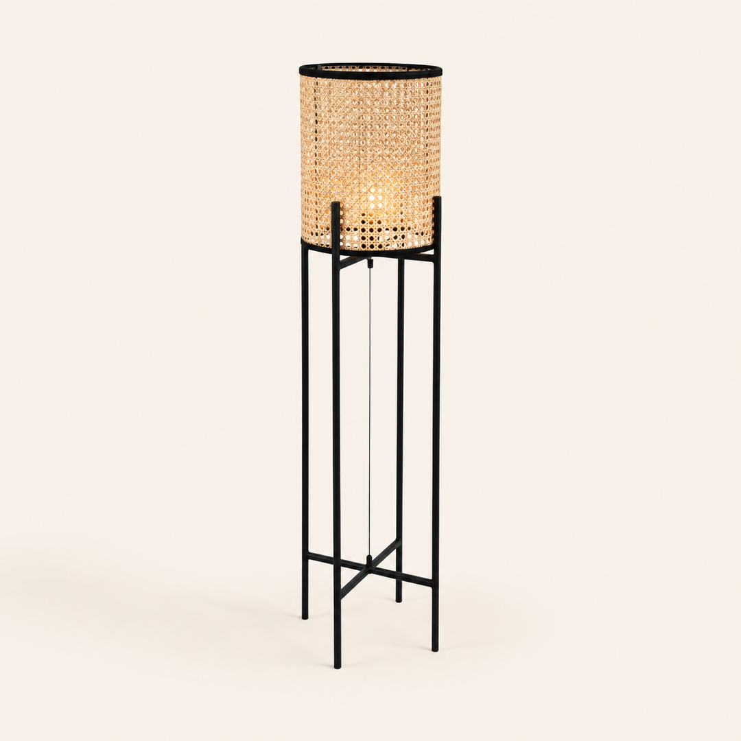 Dutch Pedestal Lamp Small with a natural woven shade and sleek black frame for warm, contemporary interiors.
