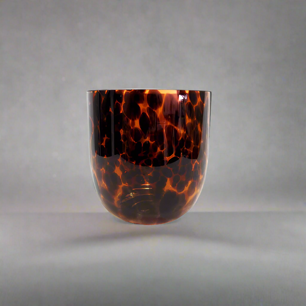 Product Description: Ruwa Vase
The Ruwa vase is an exquisite piece of glasswork, featuring a unique tortoise shell pattern. Its elegant shape and eye-catching design make it a perfect addition to any room, adding a touch of sophistication to your decor.