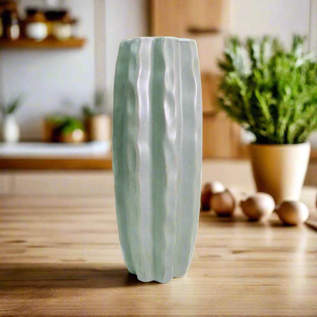 Bring the Outdoors In with the Epicenter Vase
Add a touch of natural beauty to your home with the stunning Epicenter vase. Crafted from long-lasting ceramic, this elegant vase is perfect for showcasing long-stemmed plants and greenery.
Perfect Showcase for Greenery
With its generous size (14.5cm D x 37cm H), the Epicenter vase provides ample space to display your favorite plants, branches, or flowers. Its sleek design makes it a perfect addition to any room, bringing a touch of the outdoors to your interior