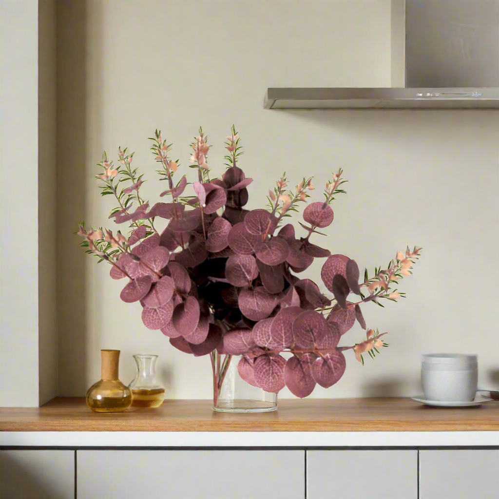 Eucaplum Bunch - Smoky Plum Elegance in Every Leaf!
Experience the beauty of Eucaplum Bunch, expertly crafted with:
160 leaves featuring intricate vein details and stunning smoky plum shades
50cmL length with 4 main stems, each branching into 16 smaller stems
Growth tips add an extra dimension, creating a lush and full appearance
Benefits:
Bring a touch of elegance and botanical beauty to any space
Artificial plants are low maintenance, no watering or pruning required
Trendy and stylish, staying forever in 