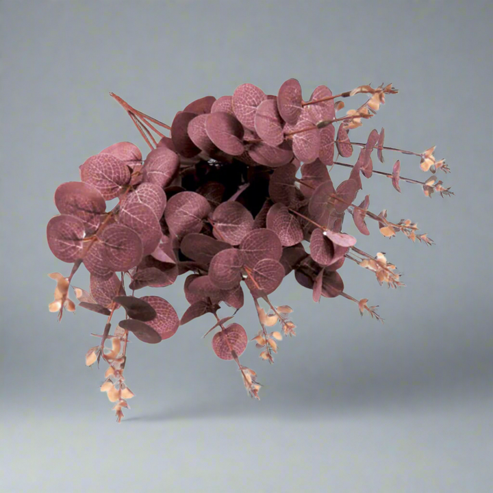 Eucaplum Bunch - Smoky Plum Elegance in Every Leaf!
Experience the beauty of Eucaplum Bunch, expertly crafted with:
160 leaves featuring intricate vein details and stunning smoky plum shades
50cmL length with 4 main stems, each branching into 16 smaller stems
Growth tips add an extra dimension, creating a lush and full appearance
Benefits:
Bring a touch of elegance and botanical beauty to any space
Artificial plants are low maintenance, no watering or pruning required
Trendy and stylish, staying forever in 