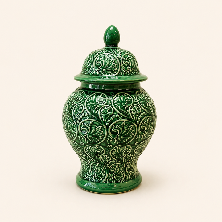 Evergreen Ginger Jar in glossy green ceramic with embossed scroll detailing and decorative lid.
