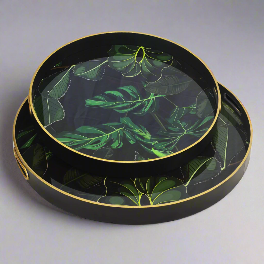 Glass Fiddle Leaf Trays - Set of 2
Elevate your home decor and entertaining style with the stunning Glass Fiddle Leaf Trays, expertly crafted to add a touch of elegance and sophistication to any interior setting.
Design Features:
Set of 2 trays: 60cm (large) and 50cm (small)
Made from high-quality glass with a beautiful fiddle leaf design
Perfect for serving snacks, appetizers, and refreshments to guests
Versatile and stylish for any living room, dining room, or office setting
Unique Boys