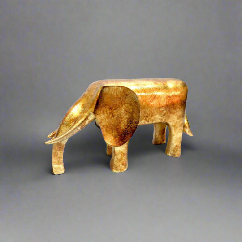 Hendrix Gold Elephant Sculpture - Elegant Modern Decor
Elevate your home decor with the stunning Hendrix Gold Elephant Sculpture, a masterpiece of modern design. Measuring 22cm x 8.5cm x 12.4cm, this beautiful gold elephant features sleek lines and a luxurious finish, adding a touch of sophistication to any room.