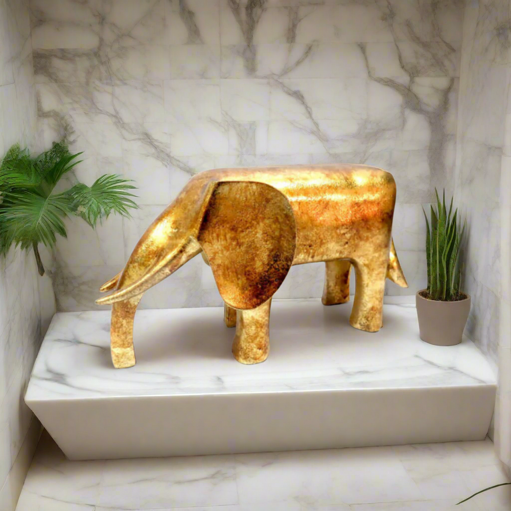 Hendrix Gold Elephant Sculpture - Elegant Modern Decor
Elevate your home decor with the stunning Hendrix Gold Elephant Sculpture, a masterpiece of modern design. Measuring 22cm x 8.5cm x 12.4cm, this beautiful gold elephant features sleek lines and a luxurious finish, adding a touch of sophistication to any room.