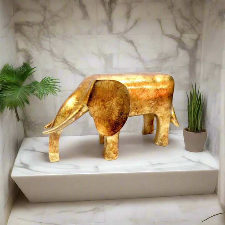 Hendrix Gold Elephant Sculpture - Elegant Modern Decor
Elevate your home decor with the stunning Hendrix Gold Elephant Sculpture, a masterpiece of modern design. Measuring 22cm x 8.5cm x 12.4cm, this beautiful gold elephant features sleek lines and a luxurious finish, adding a touch of sophistication to any room.
