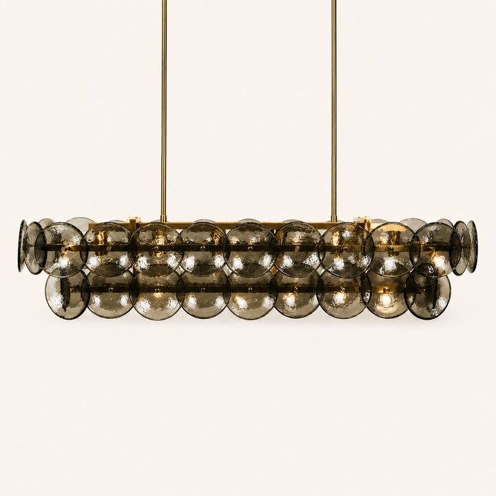 Izara Glass &amp; Brass Chandelier with smoked glass discs and warm brass detailing for elegant interiors.