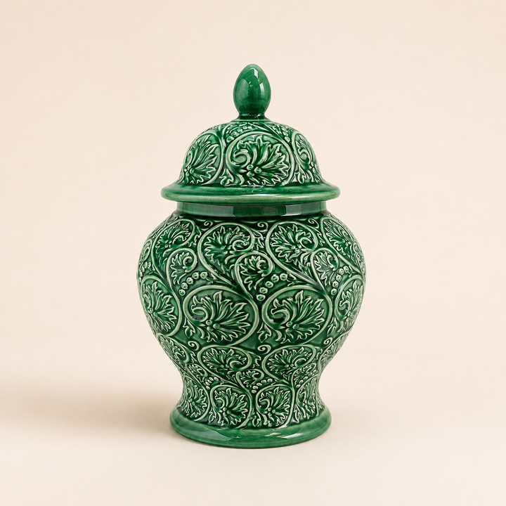 Jade Scroll Ginger Jar in glossy green ceramic with embossed scroll pattern and decorative lid.