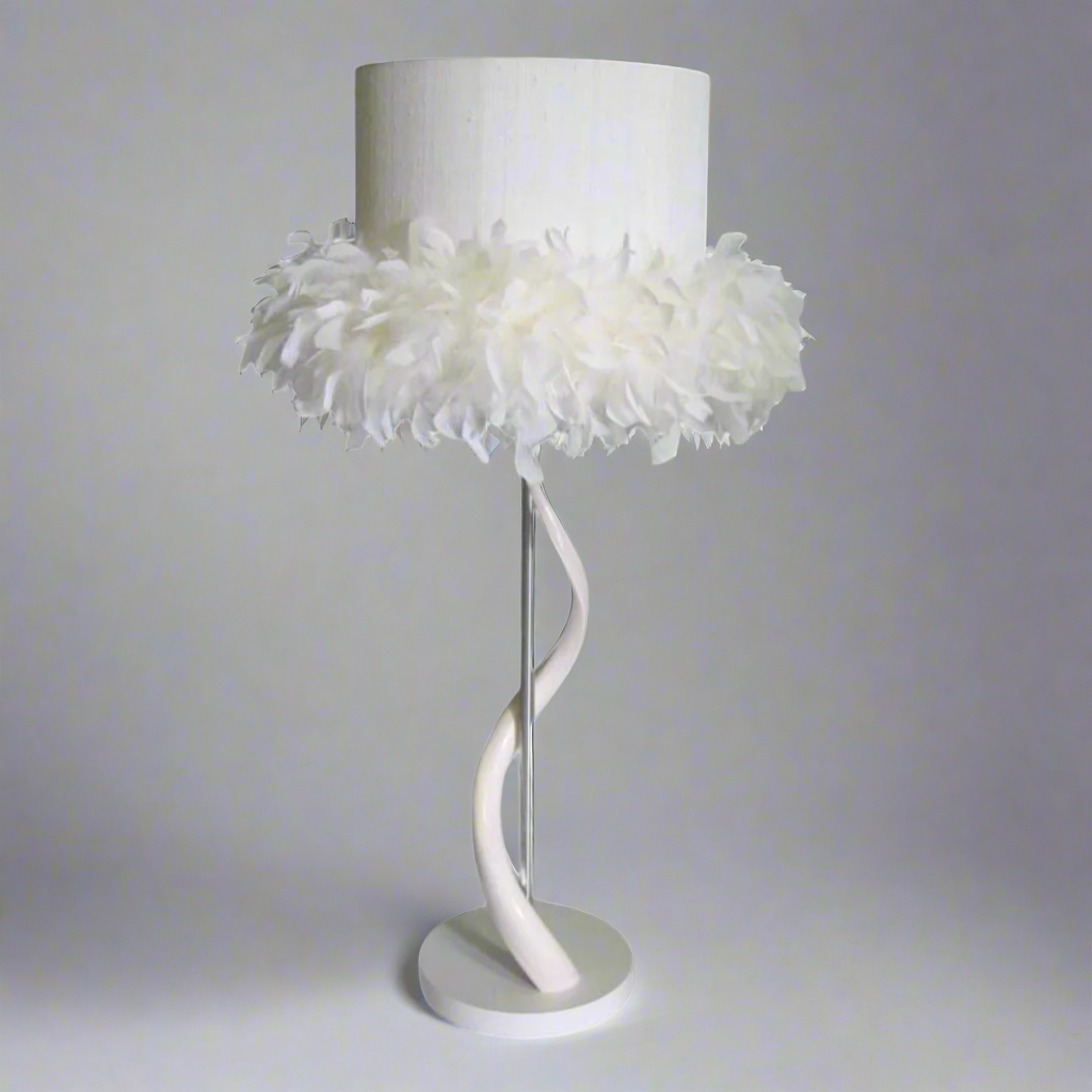 Unique Handmade Kudu Horn Lamp with Feather Boa Shade
Handcrafted in South Africa with traditional techniques
One-of-a-kind piece made from authentic Kudu horn and natural feather boa
Perfect for adding African elegance and rustic charm to any room
Supports local artisans and communities
Sustainable practices and responsible sourcing
Exceptional customer service and personalized support. Unique Boys.