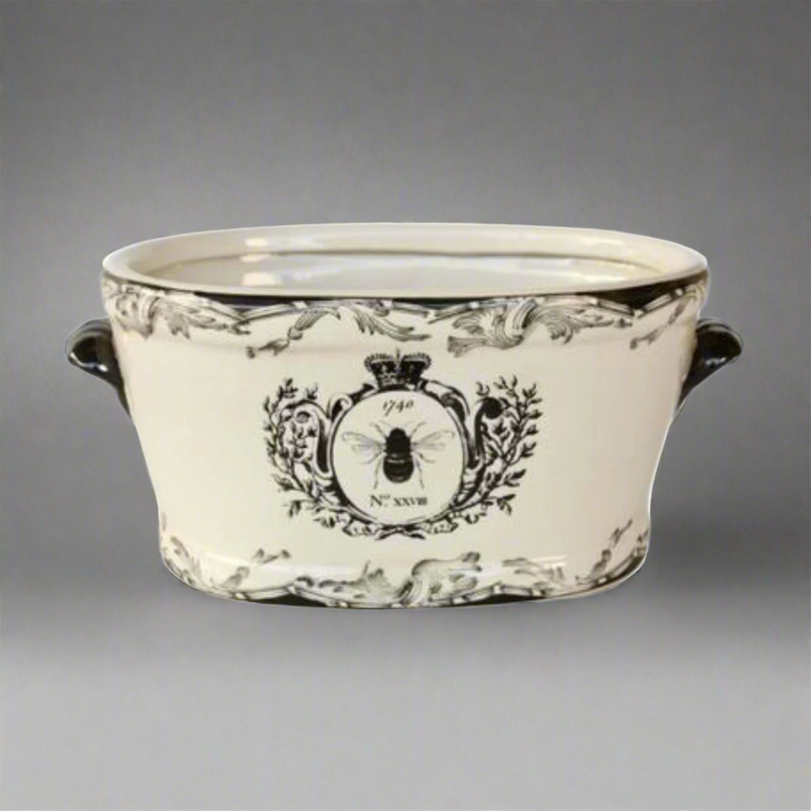 Large Black &amp; White Bee Planter
Elevate your space with a touch of whimsy and sophistication! Our Large Black &amp; White Bee Planter is a stylish ceramic masterpiece featuring a vibrant bee motif that's sure to captivate anyone's attention. Whether you're looking to add a decorative piece to your indoor space or a charming accent to your outdoor garden, this beautiful planter is the perfect choice. Unique Boys.