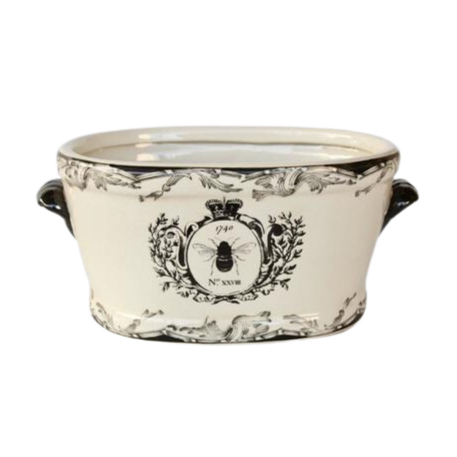 Large Black &amp; White Bee Planter
Elevate your space with the Large Black &amp; White Bee Planter, a stylish ceramic planter featuring a vibrant bee motif. Measuring 20x22x27cm, it's perfect for indoor and outdoor use, adding a touch of charm to any room or garden.