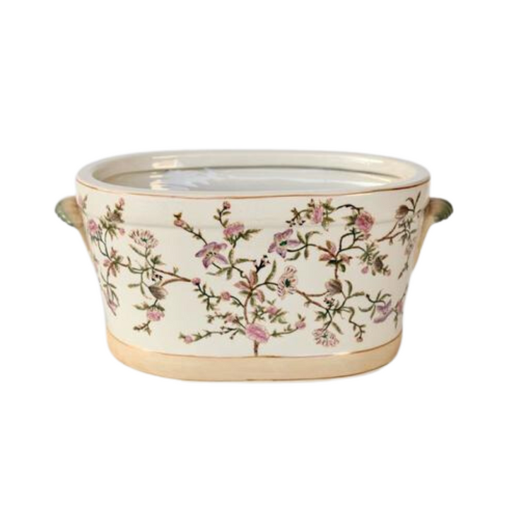 Large Pink Floral Foot Bath Planter
Dual-purpose elegance! This beautiful pink floral ceramic foot bath doubles as a stylish planter. Its generous size (22x45x28cm) accommodates a relaxing foot soak or showcases your favorite plants. The decorative design adds a touch of sophistication to any space.