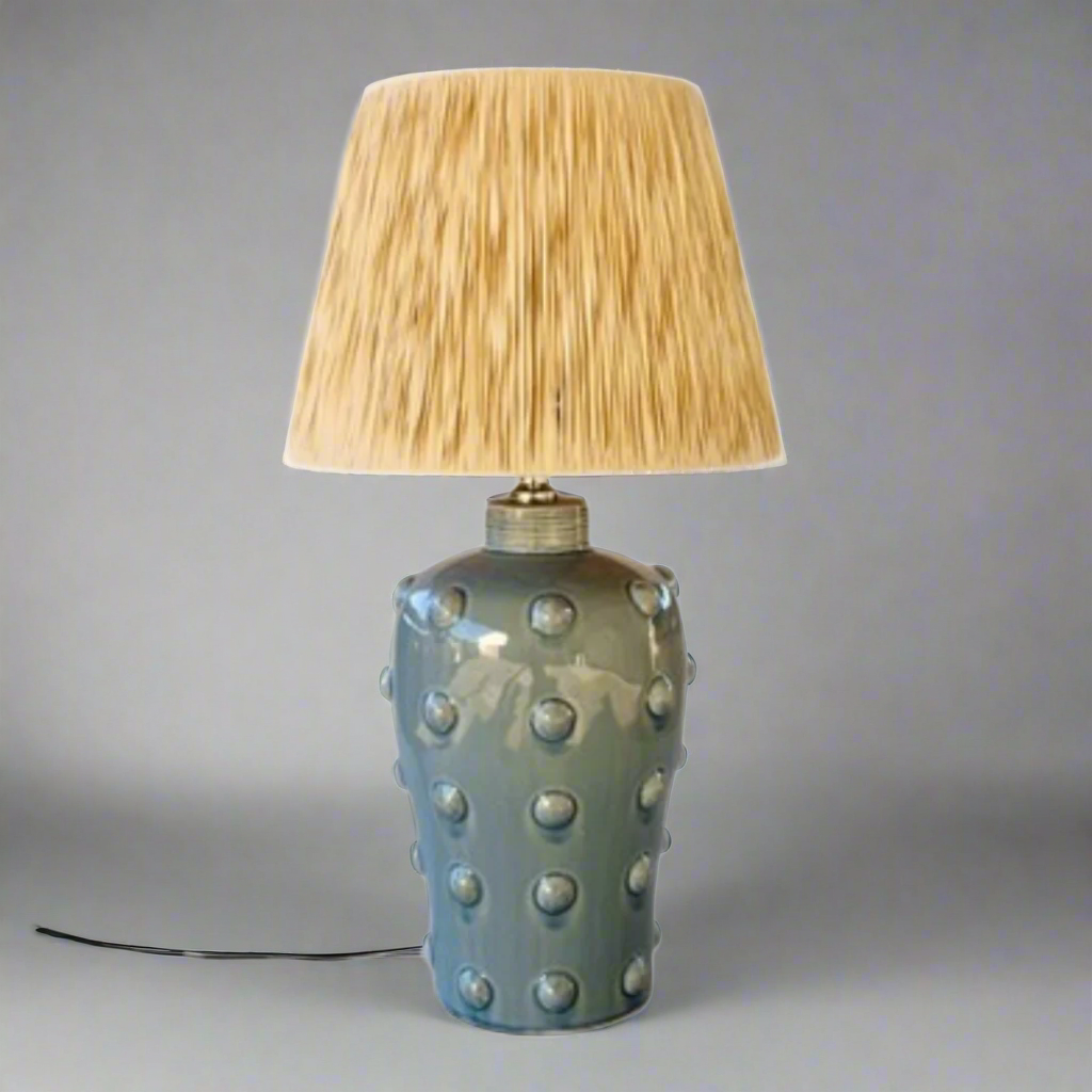 Light Blue Lamp Base Rafia Shade 71X38cm
Add a touch of coastal charm to your space with our stunning Light Blue Lamp Base paired with a natural Rafia Shade. This unique lamp features a soothing light blue base paired with a woven rafia shade, creating a natural and earthy ambiance perfect for relaxing or entertaining. Measuring 71cm in height and 38cm in width, this lamp is perfectly sized for living rooms, bedrooms, or offices.Unique Boys