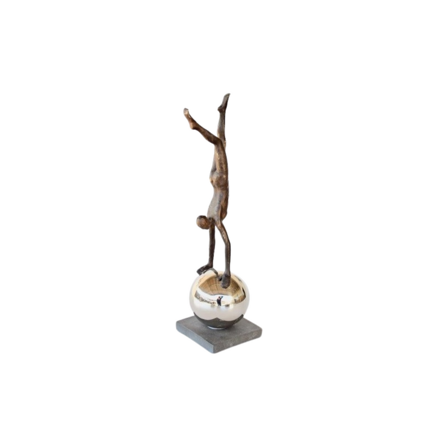 Man on Silver Ball 51x13x13cm
Elevate your space with the Man on Silver Ball, a striking sculpture that showcases a unique and eye-catching design. Measuring 51x13x13cm, this piece features a polished silver finish that adds a touch of luxury and sophistication to any room or office. www.uniqueboys.co.za