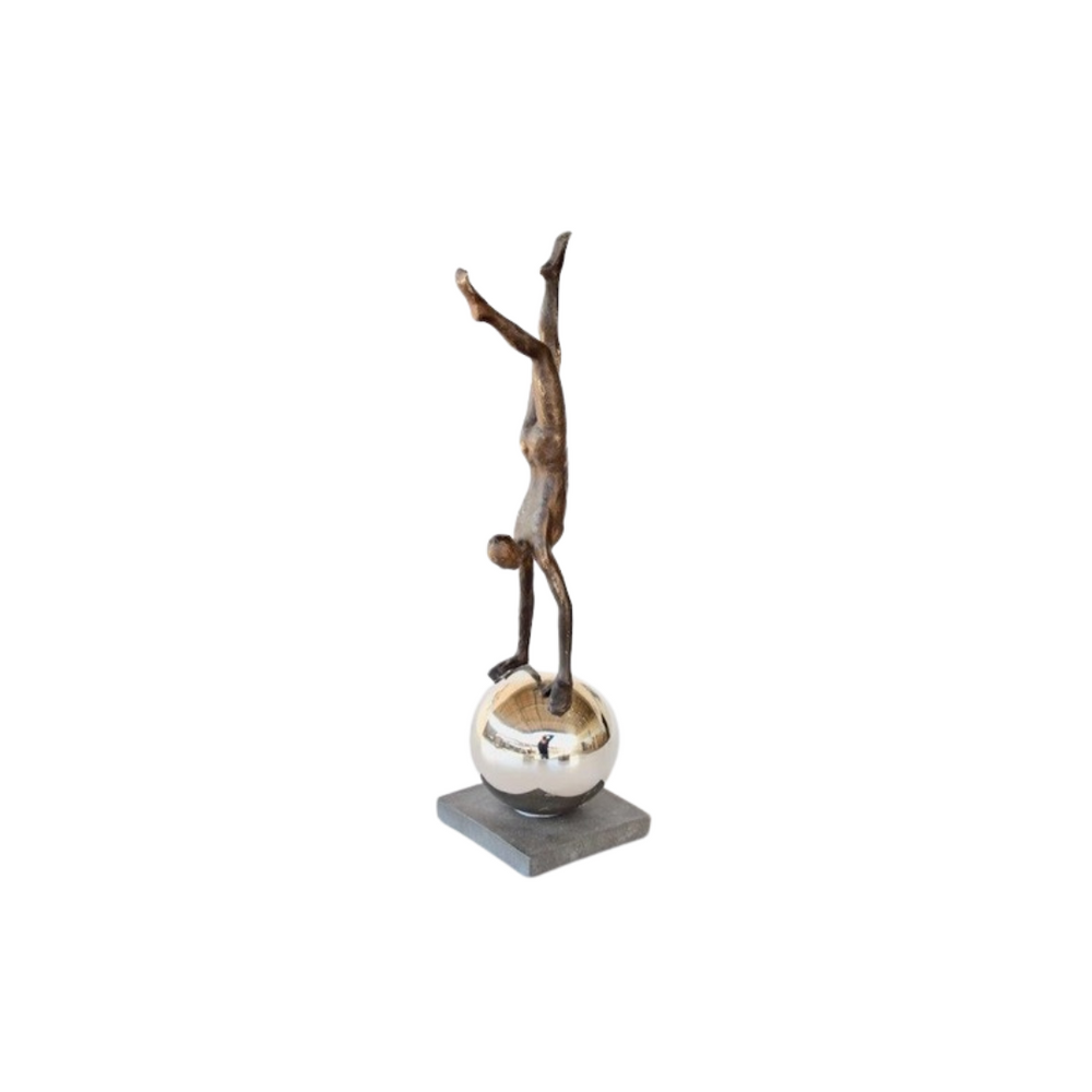 Man on Silver Ball 51x13x13cm
Elevate your space with the Man on Silver Ball, a striking sculpture that showcases a unique and eye-catching design. Measuring 51x13x13cm, this piece features a polished silver finish that adds a touch of luxury and sophistication to any room or office. www.uniqueboys.co.za