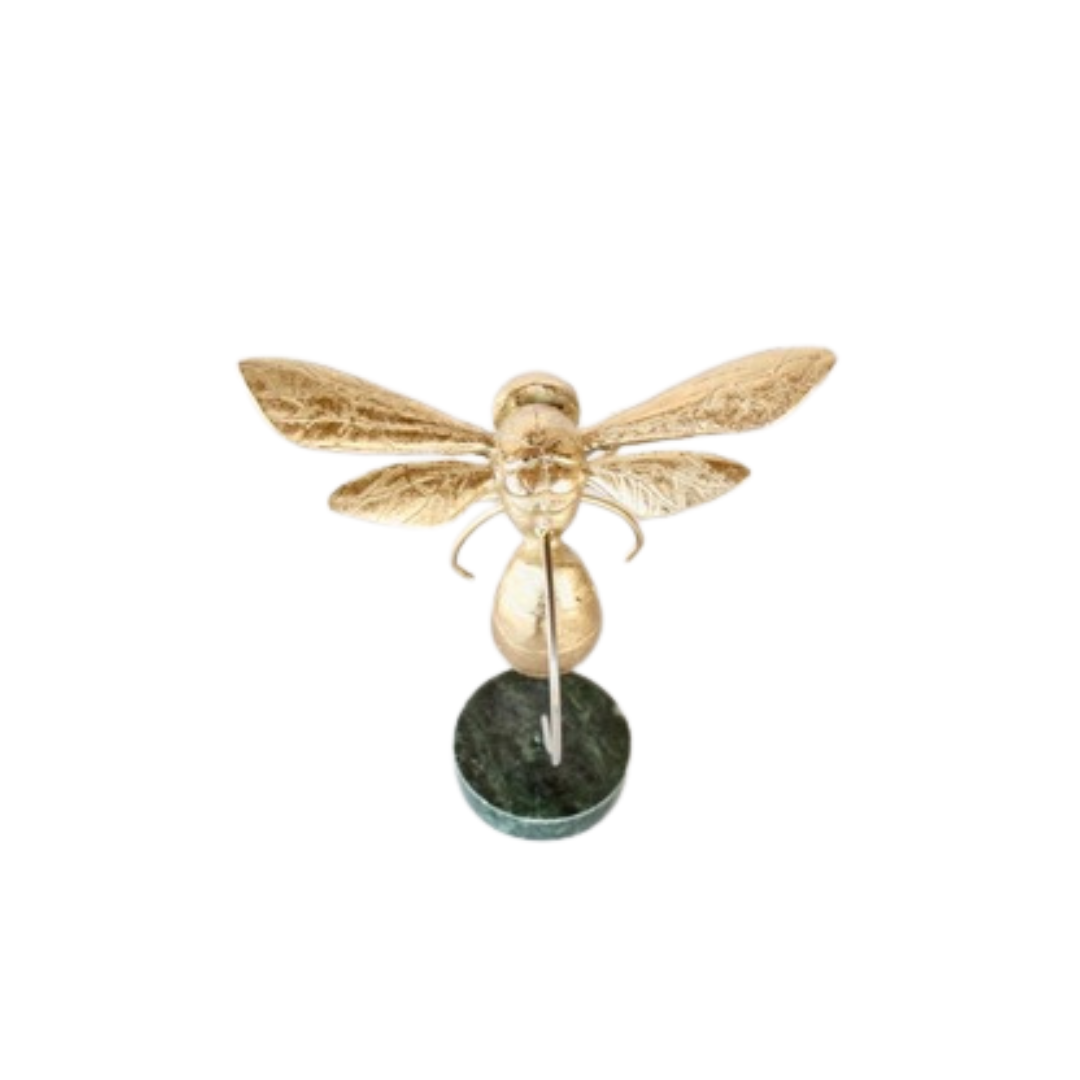 This medium-sized gold bumblebee is expertly crafted and displayed on a beautiful marble base, measuring 19x18x10cm. Enhance your home decor or office space with this unique and elegant piece. Made with precision and attention to detail, this bumblebee adds a touch of sophistication to any setting.UNIQUE Boys.