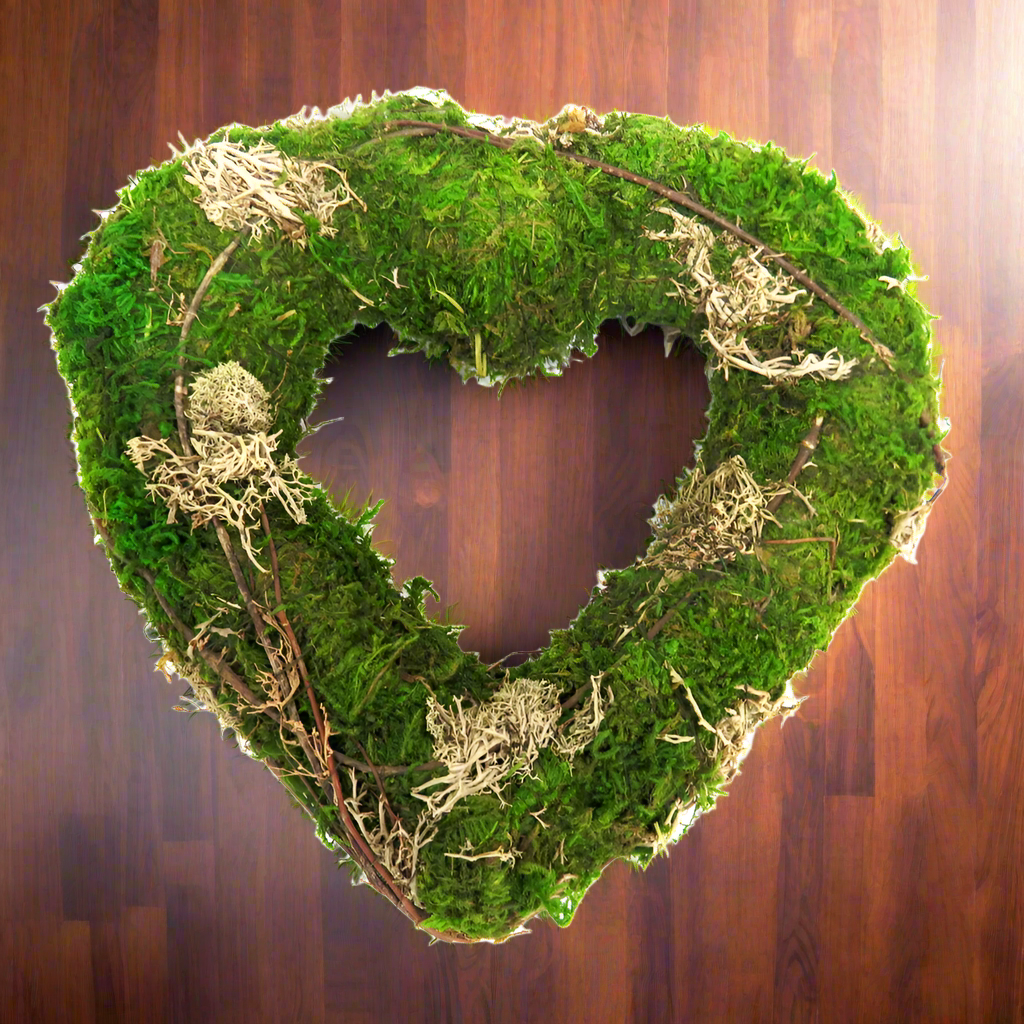Bring the Beauty of Nature Indoors with the Moss Magic Heart
Add a touch of serenity and elegance to your space with the enchanting Moss Magic Heart. Handwoven with lush moss, delicate lichen, and intricate twigs, this double-sided heart is a masterpiece of natural art.