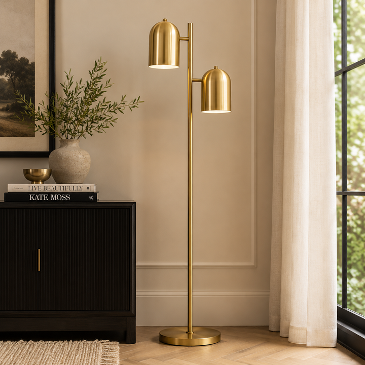 Elevate your interior with the Maximus Floor Lamp, featuring a sleek gold finish and stylish double shades.