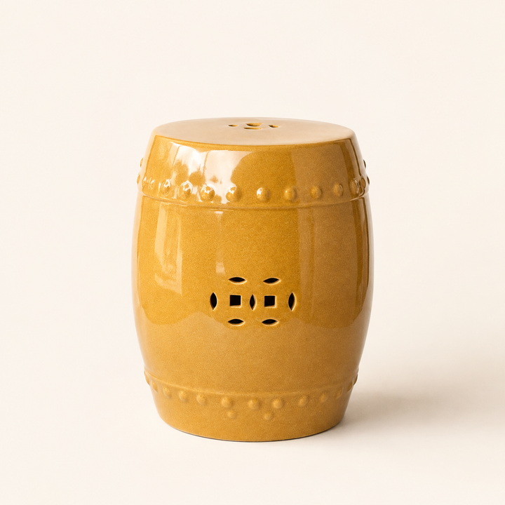 Luxury mustard ceramic garden stool, perfect as seating, a side table or decorative home accent.