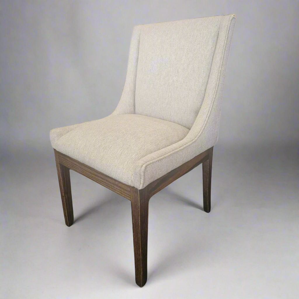 Nasira Chair Oak in Alba
More than just a chair, our stunning Oak Nasira chair Alba is a statement piece that brings elegance and sophistication to your dining space. Expertly crafted from high-quality Solid Oak, this chair seamlessly blends style and functionality, perfect for creating lasting memories with family and friends. www.uniqueboys.co.za