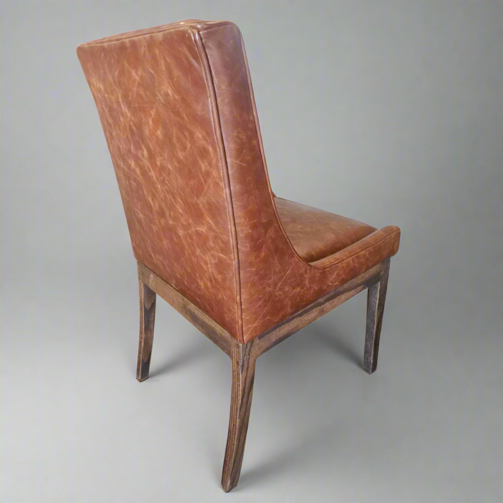 Nasira Chair Oak in Full Grain Leather colour Harness
More than just a chair, our stunning Oak Nasira chair Full Grain Leather colour Harness is a statement piece that brings elegance and sophistication to your dining space. Expertly crafted from high-quality Solid Oak, this chair seamlessly blends style and functionality, perfect for creating lasting memories with family and friends.