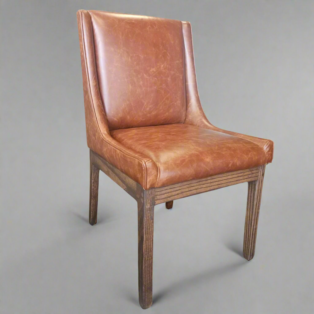 Nasira Chair Oak in Full Grain Leather colour Harness
More than just a chair, our stunning Oak Nasira chair Full Grain Leather colour Harness is a statement piece that brings elegance and sophistication to your dining space. Expertly crafted from high-quality Solid Oak, this chair seamlessly blends style and functionality, perfect for creating lasting memories with family and friends.