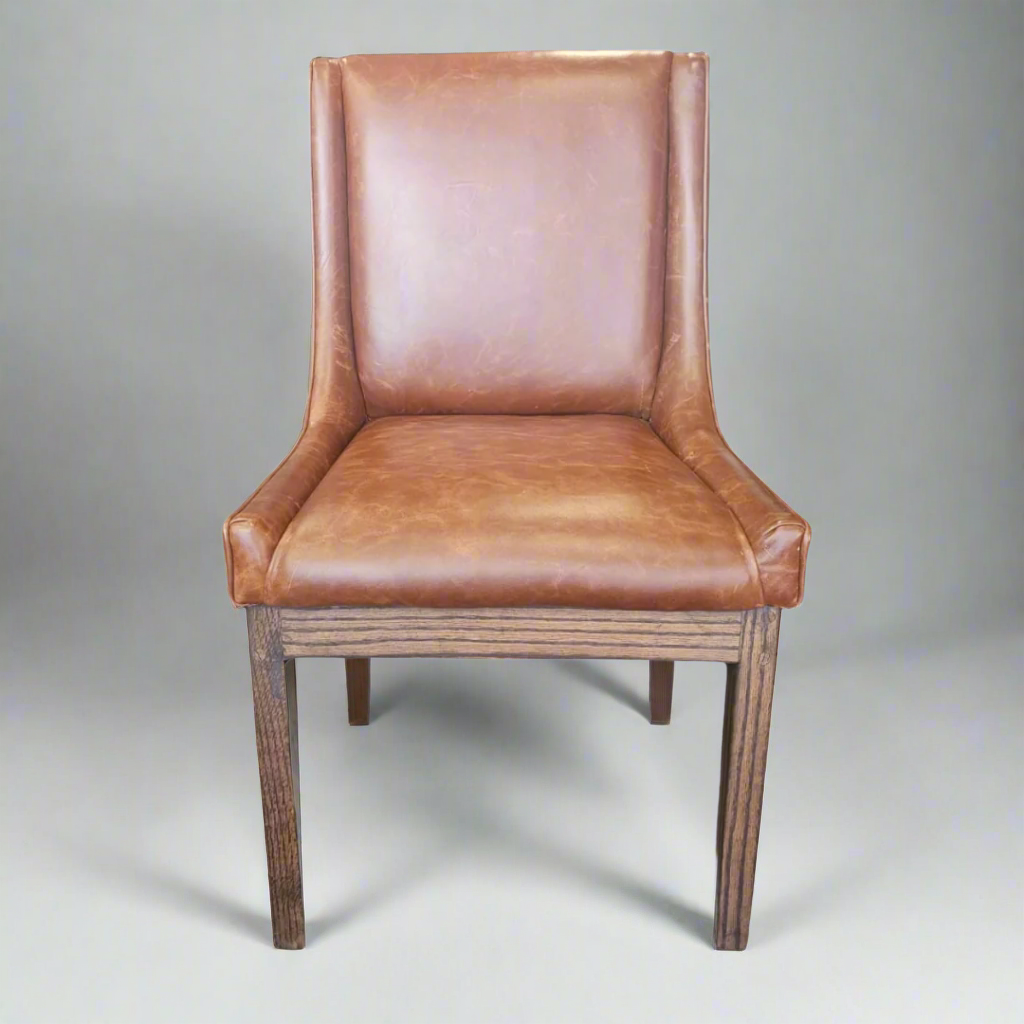 Nasira Chair Oak in Full Grain Leather colour Harness
More than just a chair, our stunning Oak Nasira chair Full Grain Leather colour Harness is a statement piece that brings elegance and sophistication to your dining space. Expertly crafted from high-quality Solid Oak, this chair seamlessly blends style and functionality, perfect for creating lasting memories with family and friends.